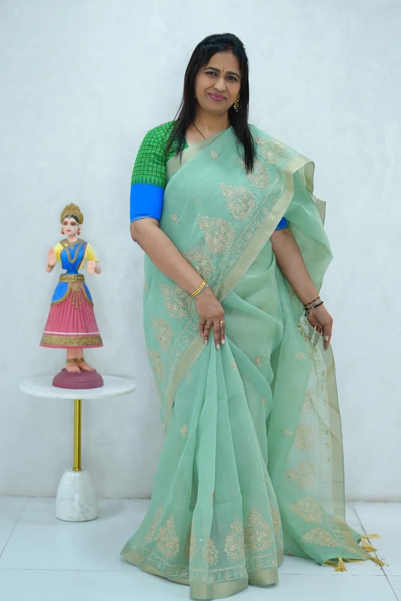 Cotton Silk saree teal with thread buttas, zari border and floral design embroidery