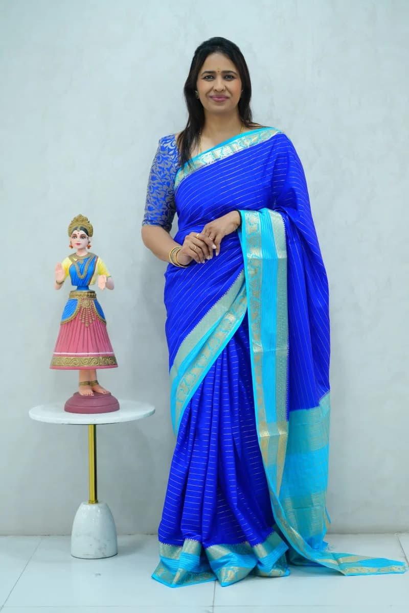 Crepe silk saree in bright and light blue combination