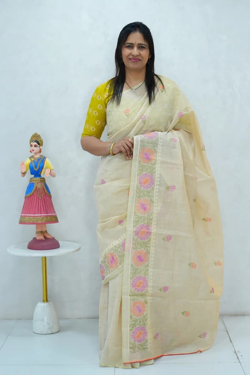 Cotton Silk saree in beige with all over thread buttas and floral design embroidery