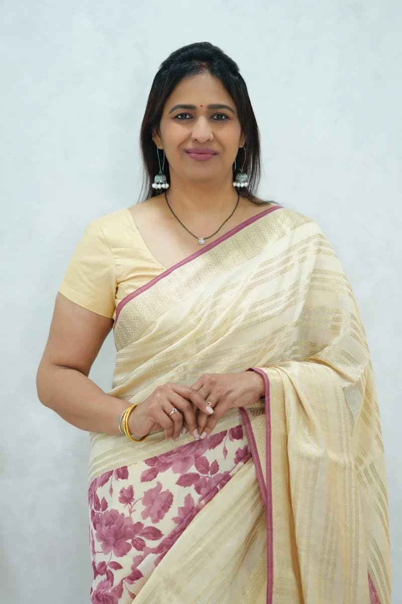 Soft cotton saree in beige with reddish pink floral print